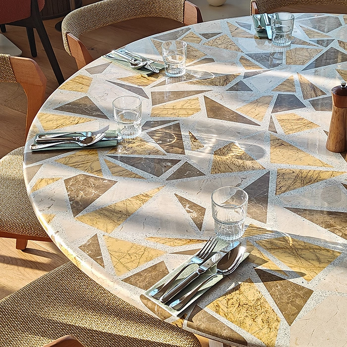 Round Table with geometric terrazzo pattern finish